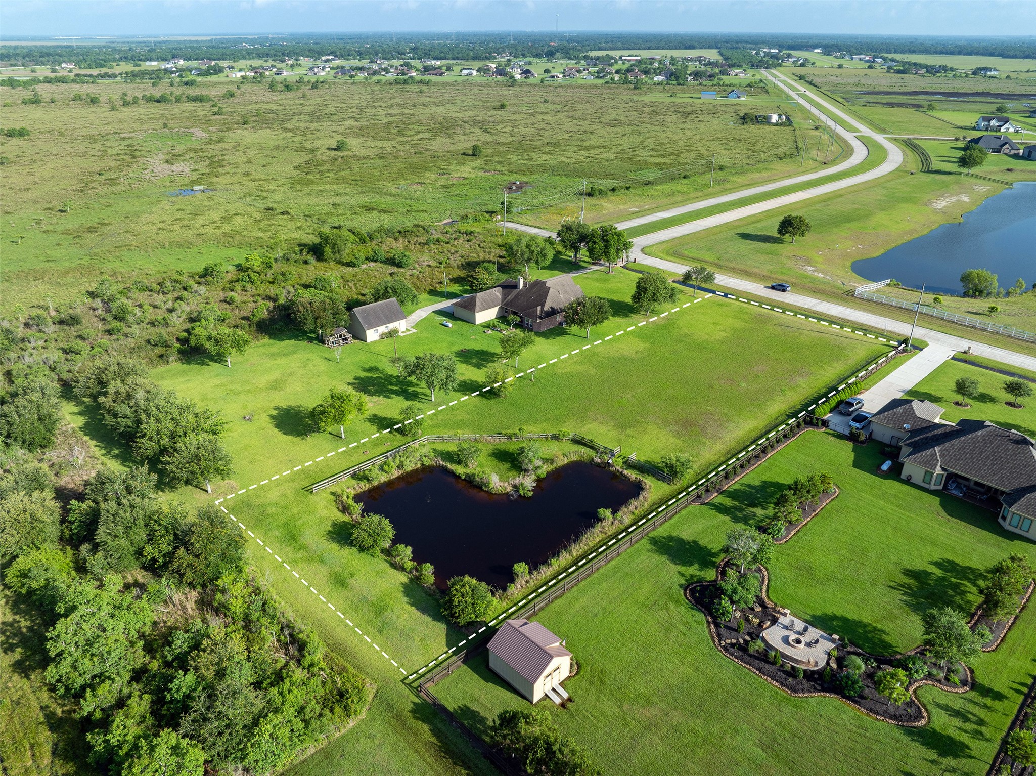 7706 Pebble Hill Lane Rosharon, TX 77583 - Photo 12 of 16 a view of an outdoor space and a lake view