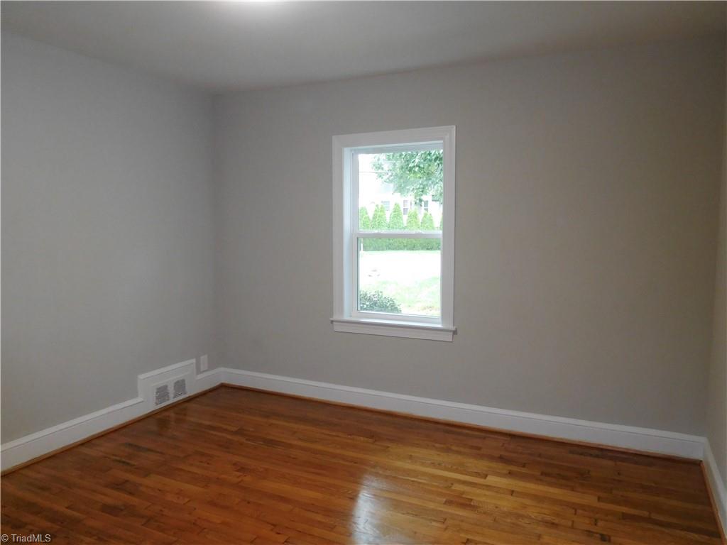 2126 Polo Road Winston-Salem, NC 27106 - Photo 17 of 33 BR 1. There is not a Primary Suite. The front BR is the largest.