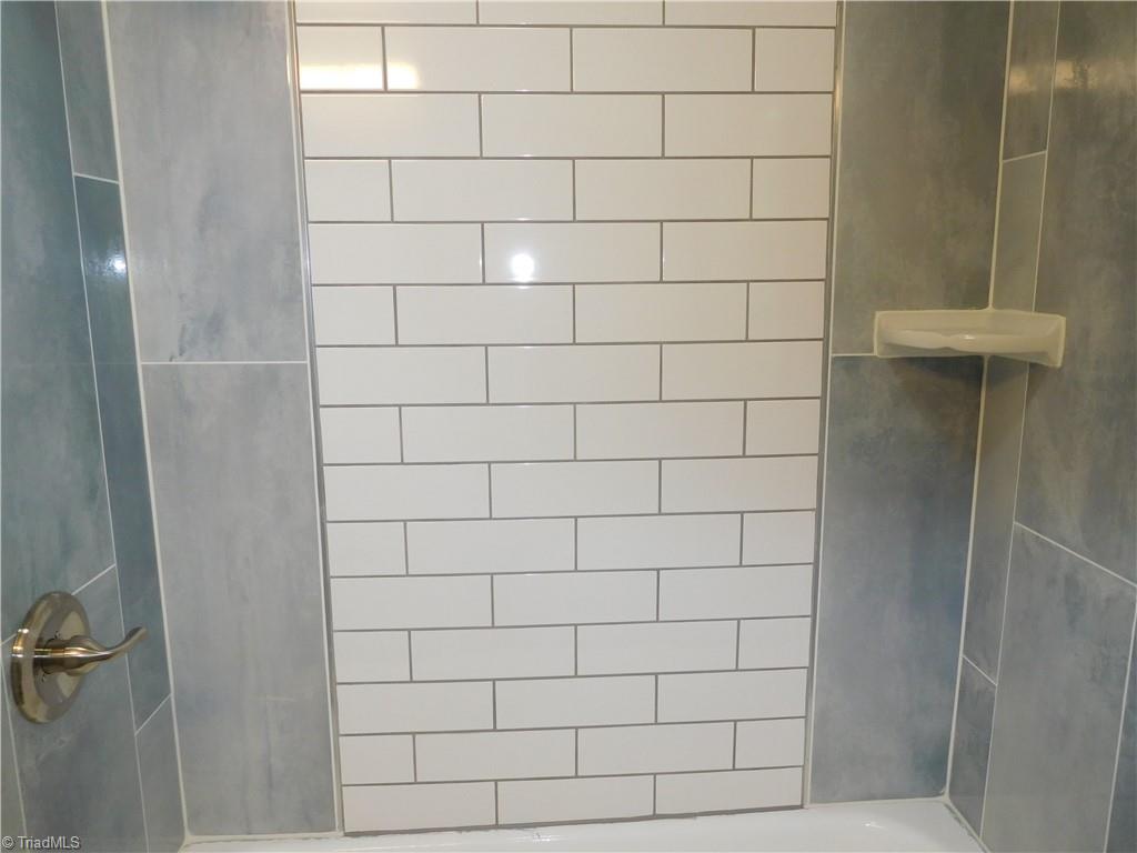 2126 Polo Road Winston-Salem, NC 27106 - Photo 23 of 33 Beautifully Tiled surround for Tub/Shower.