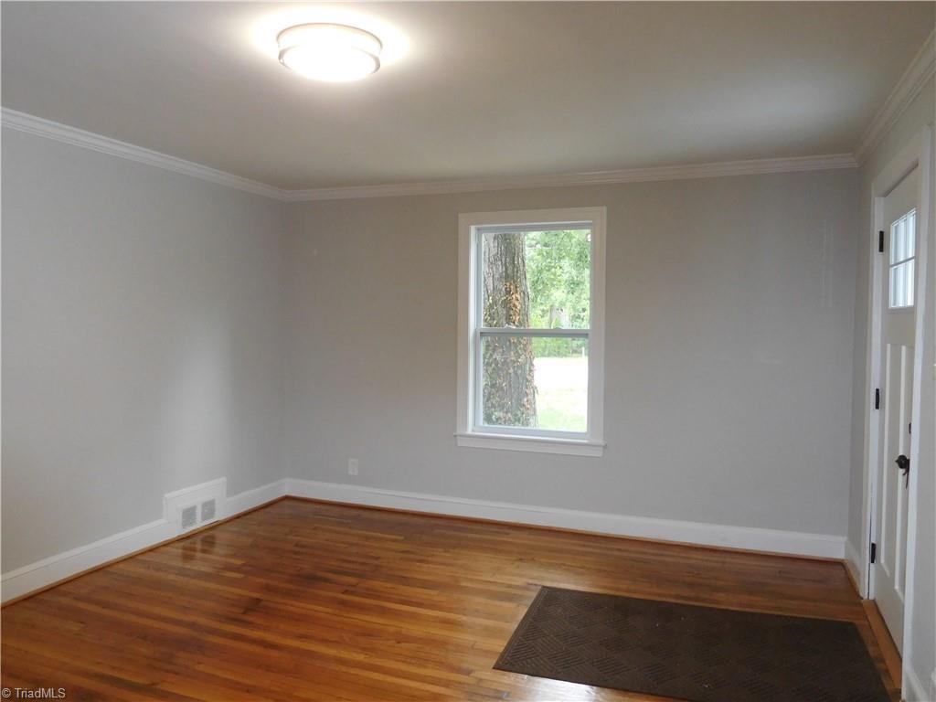 2126 Polo Road Winston-Salem, NC 27106 - Photo 6 of 33 Spacious Living Room. Fresh Paint and new fixtures throughout.