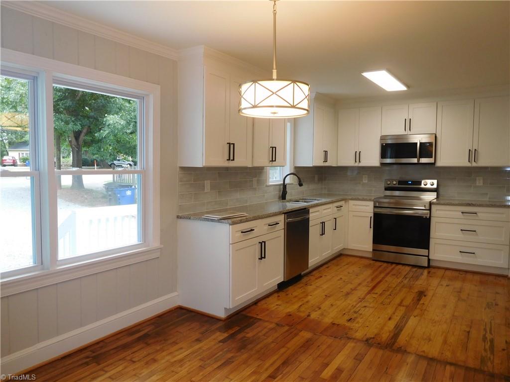 2126 Polo Road Winston-Salem, NC 27106 - Photo 9 of 33 Looking at Kitchen from DR.