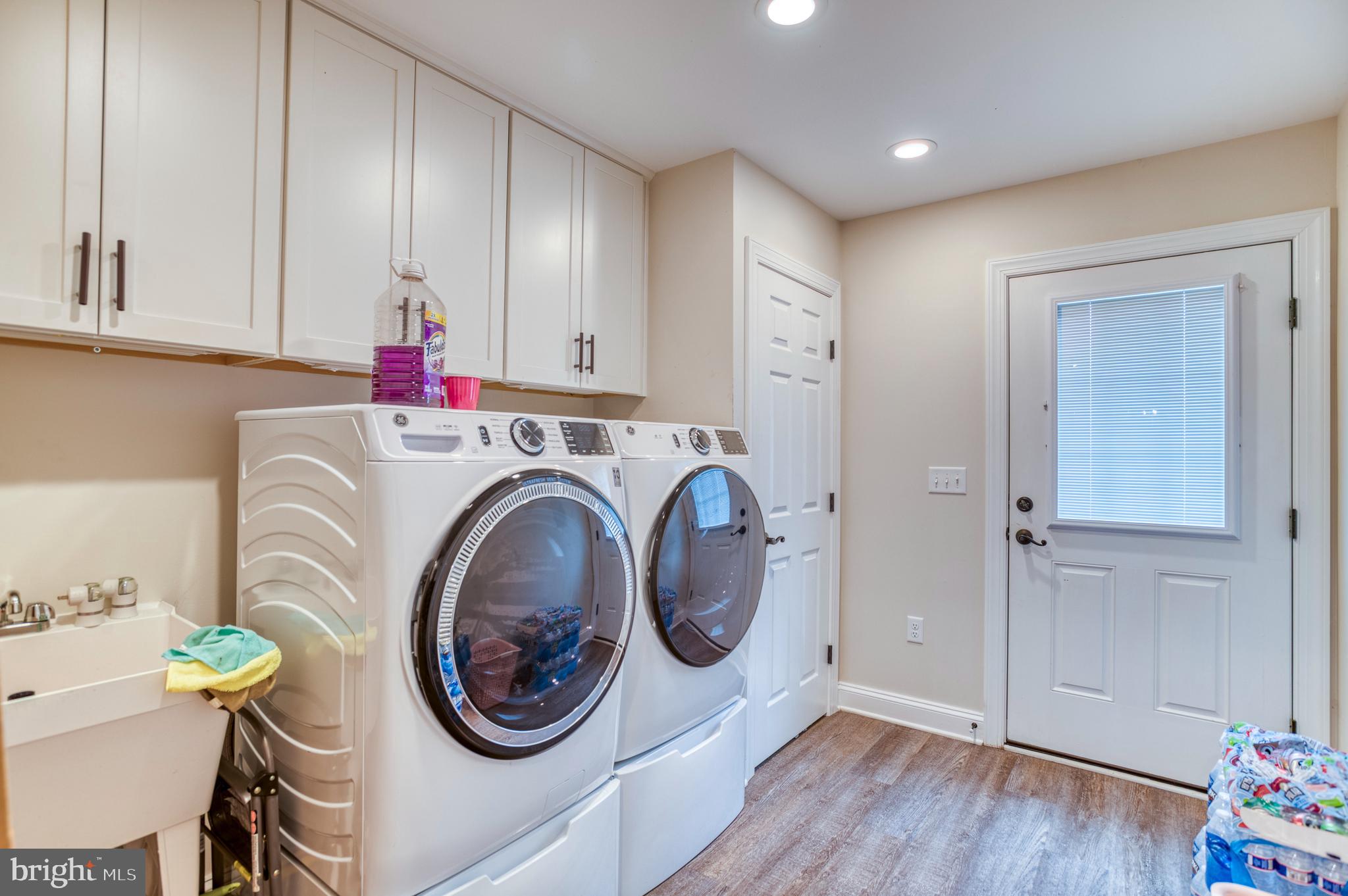 13084 Stonehouse Mountain Road Culpeper, VA 22701 - Photo 11 of 37 a view of kitchen and utility room
