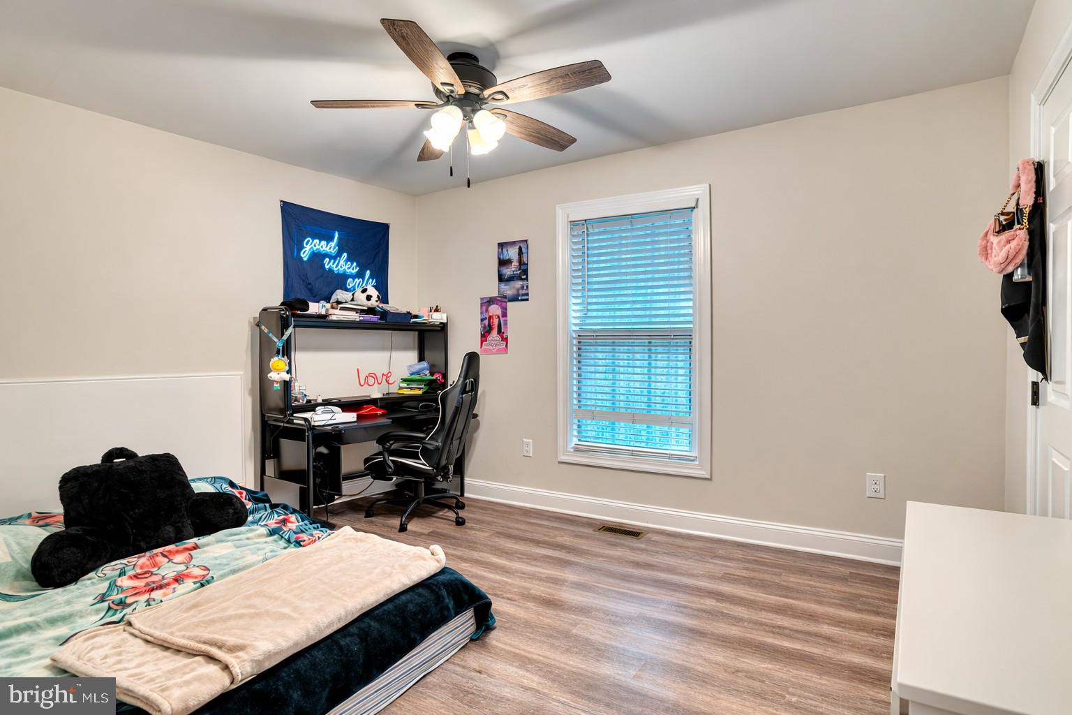 13084 Stonehouse Mountain Road Culpeper, VA 22701 - Photo 16 of 37 a view of a workspace with furniture and a window