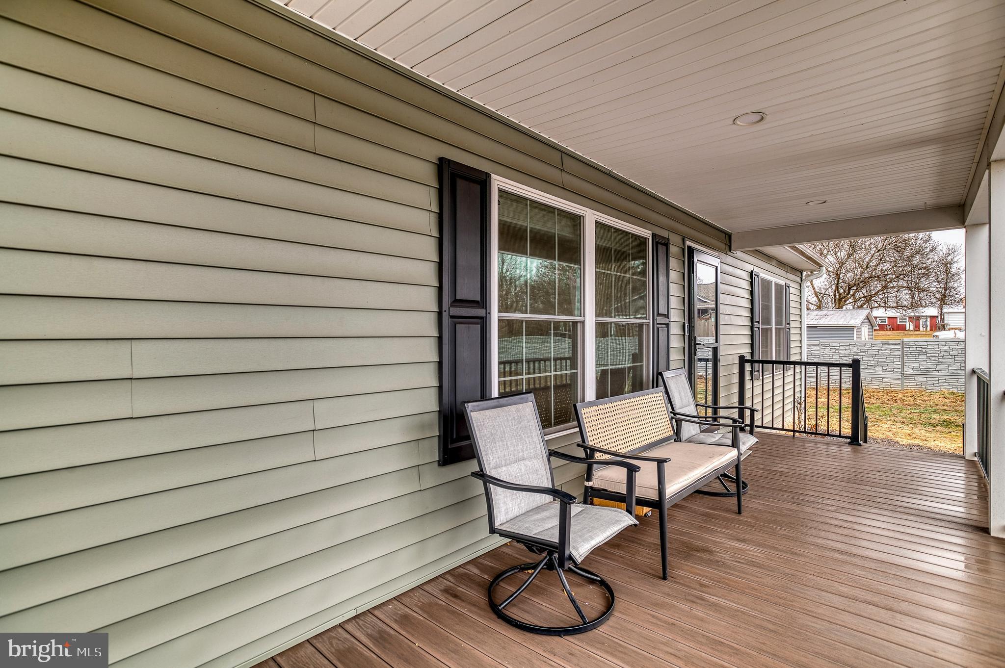 13084 Stonehouse Mountain Road Culpeper, VA 22701 - Photo 21 of 37 a outdoor view with a seating space
