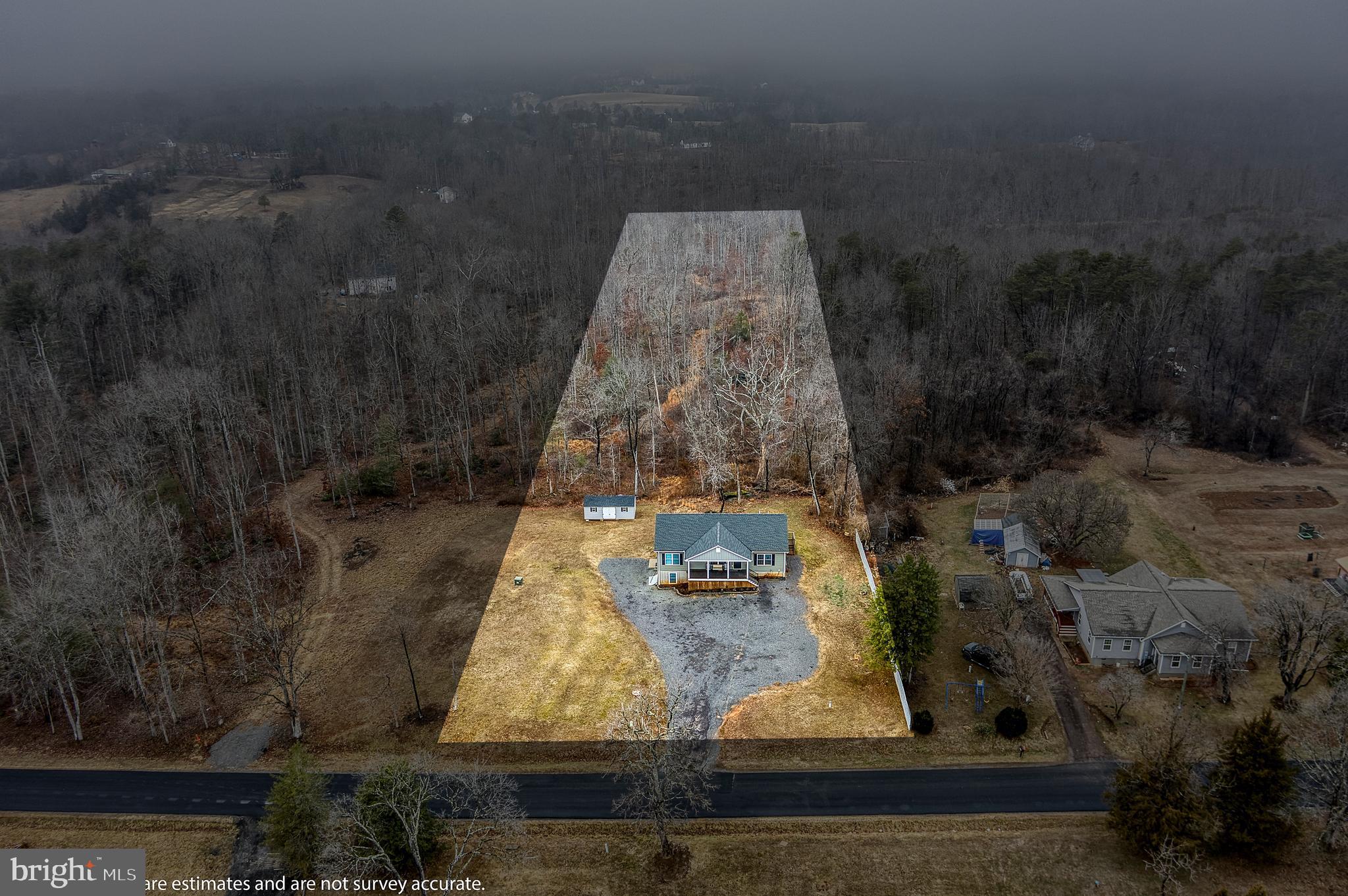 13084 Stonehouse Mountain Road Culpeper, VA 22701 - Photo 35 of 37 an aerial view of a residential houses with yard