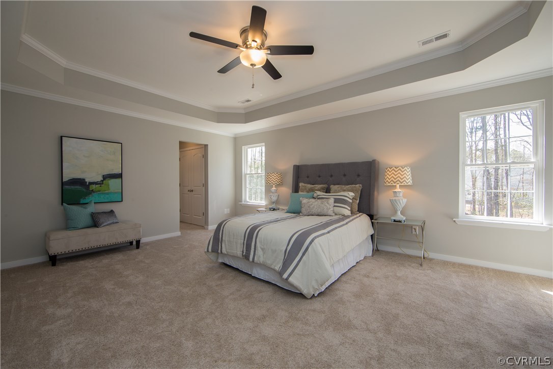 8955 Lavenham Loop Midlothian, VA 23112 - Photo 29 of 47 a bed room with a bed and a chandelier