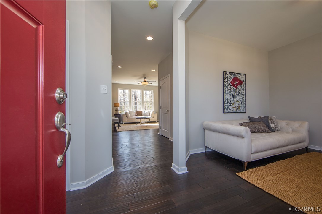 8955 Lavenham Loop Midlothian, VA 23112 - Photo 3 of 47 a living room with furniture and a wooden floor