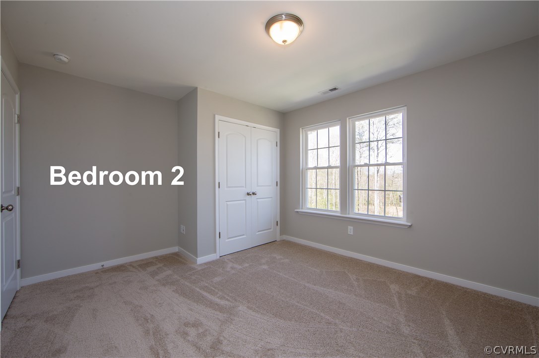 8955 Lavenham Loop Midlothian, VA 23112 - Photo 37 of 47 a view of an empty room with a window