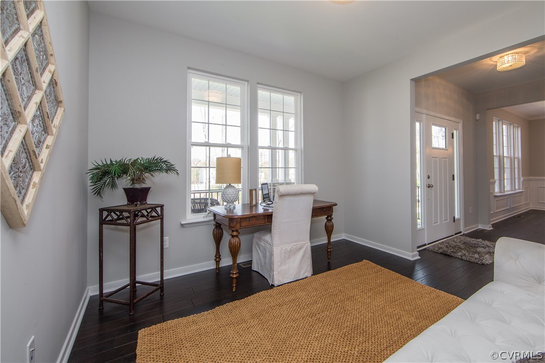 8955 Lavenham Loop Midlothian, VA 23112 - Photo 6 of 47 a very nice looking dining room with a table and chairs