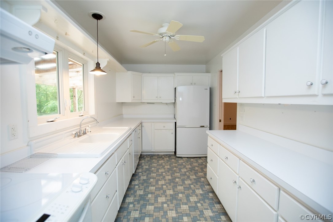 1771 Saw Mill Road Farmville, VA 23901 - Photo 13 of 48 a kitchen with a sink stove and cabinets