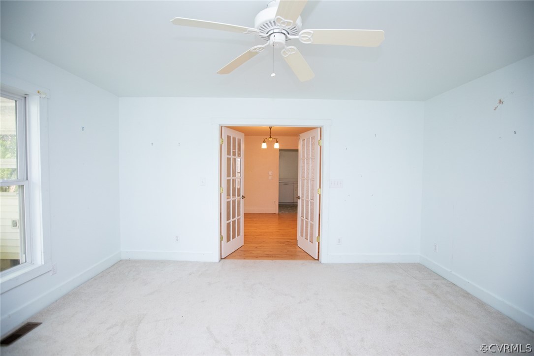 1771 Saw Mill Road Farmville, VA 23901 - Photo 20 of 48 an empty room with a fan and a window