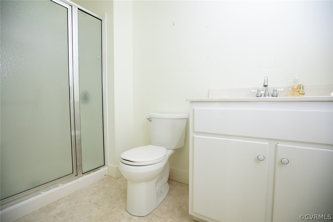 1771 Saw Mill Road Farmville, VA 23901 - Photo 23 of 48 a bathroom with a toilet and a sink
