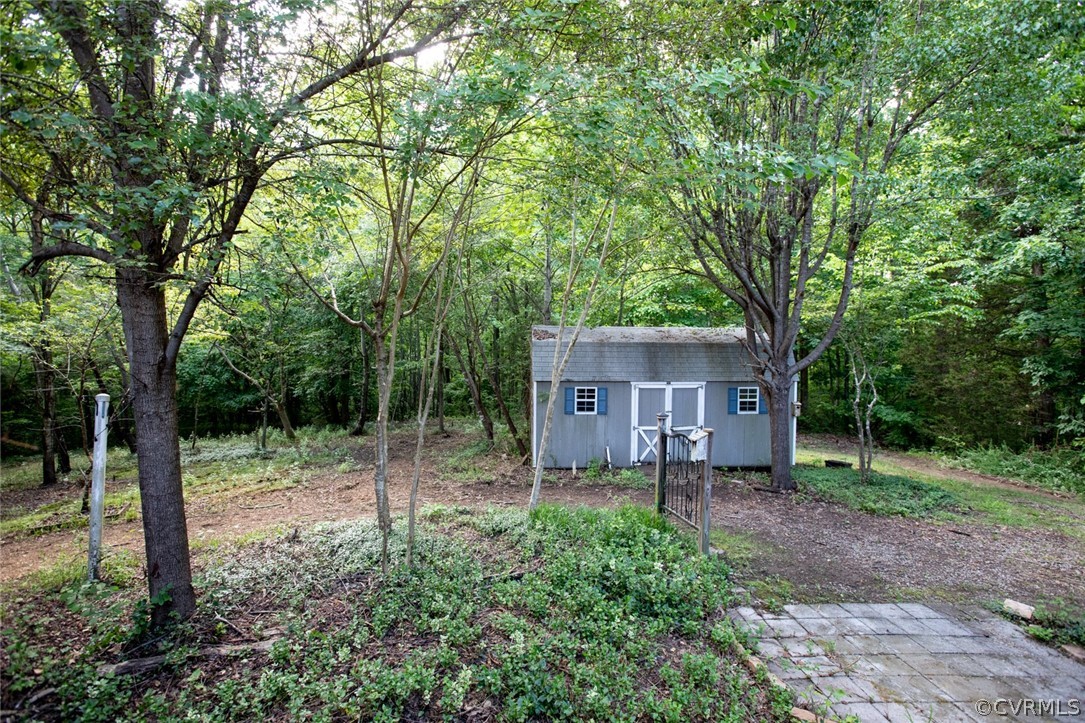 1771 Saw Mill Road Farmville, VA 23901 - Photo 41 of 48 a backyard of a house with lots of green space and fountain