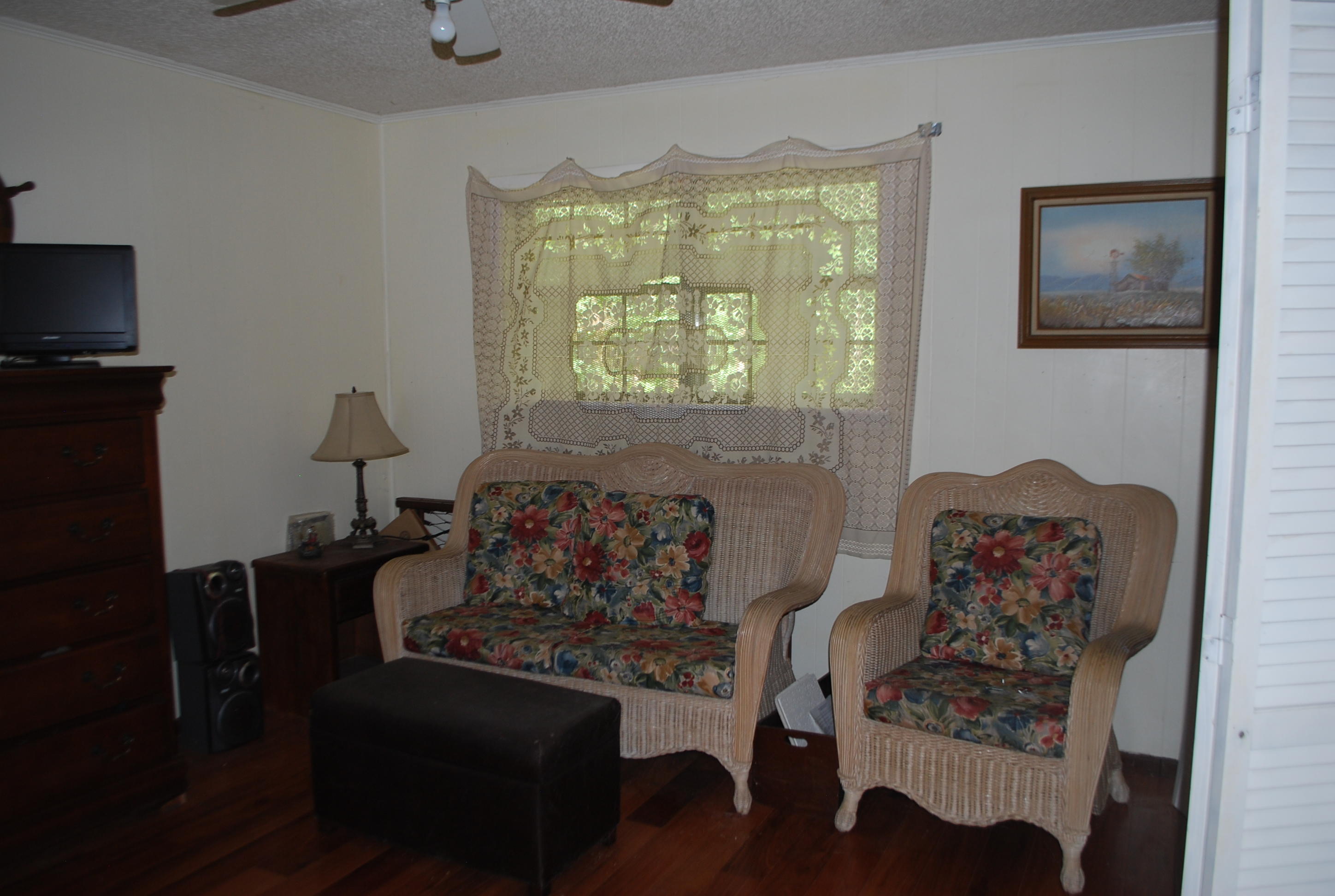 3602 Poverty Creek Road Crestview, FL 32539 - Photo 19 of 29 a living room with furniture and a window