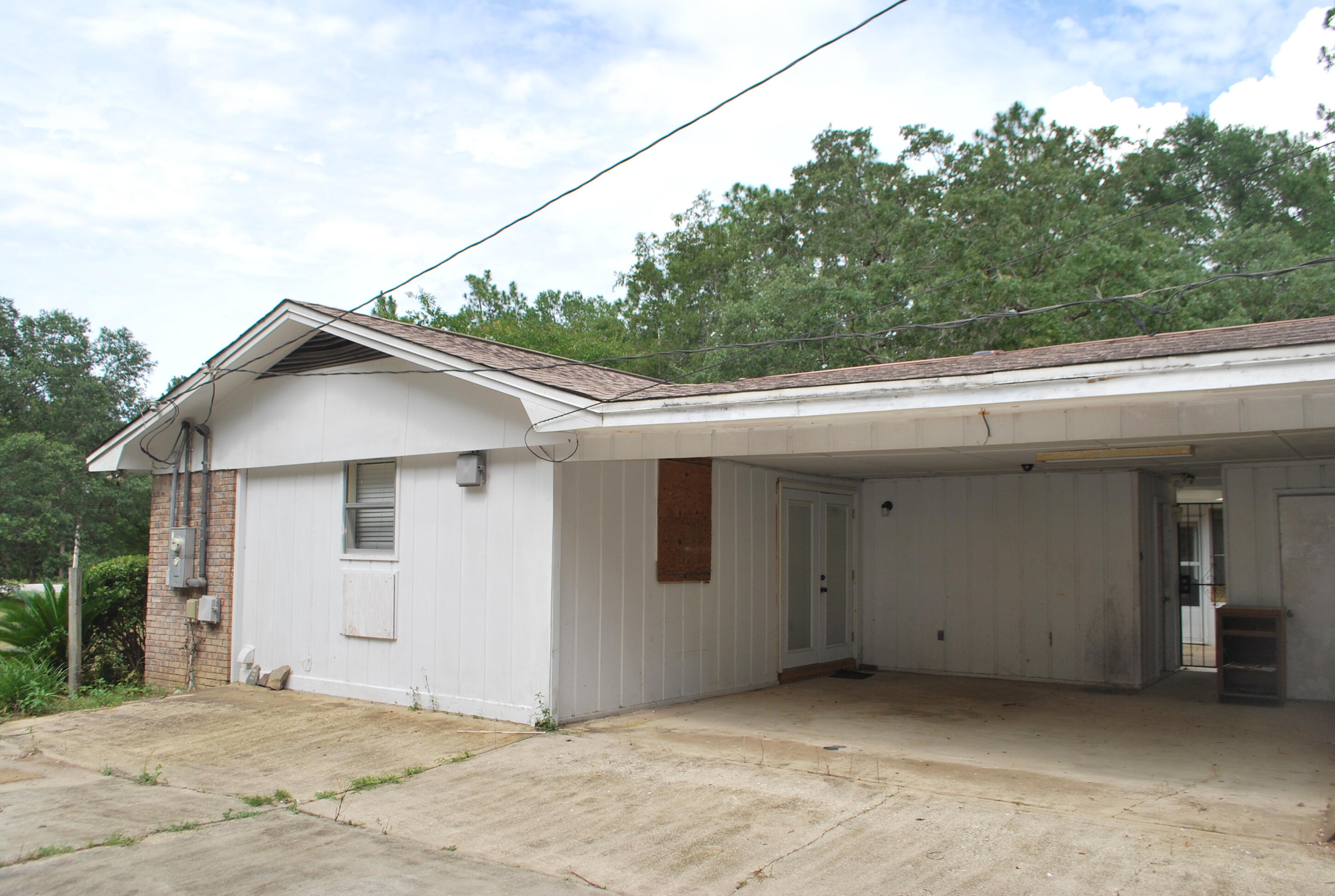3602 Poverty Creek Road Crestview, FL 32539 - Photo 6 of 29 a view of a house with a backyard