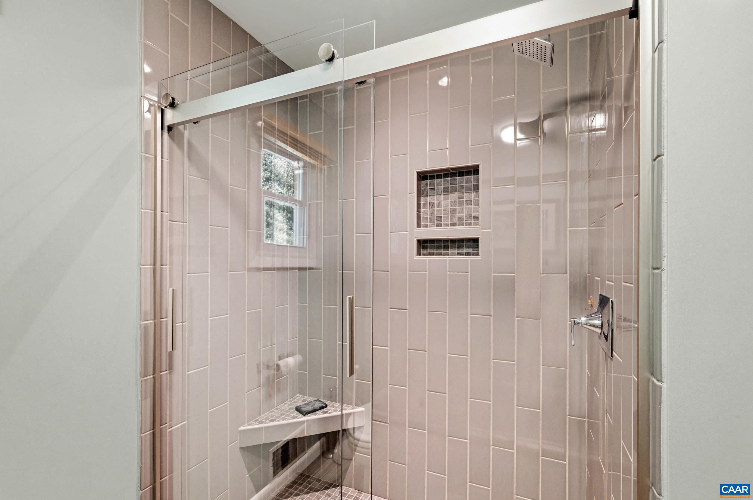 103 Powhatan Circle Charlottesville, VA 22901 - Photo 14 of 75 a bathroom with a shower and a sink