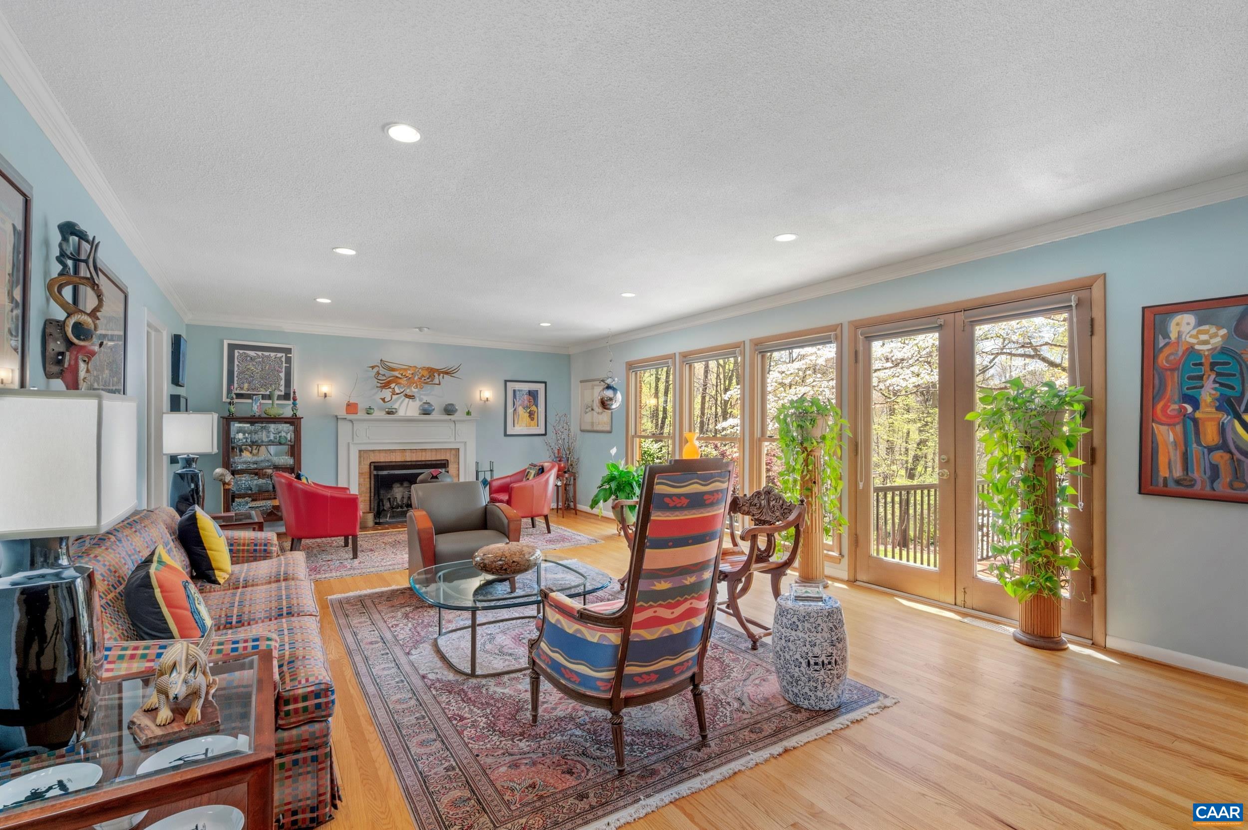 103 Powhatan Circle Charlottesville, VA 22901 - Photo 15 of 75 a living room with furniture and a floor to ceiling window
