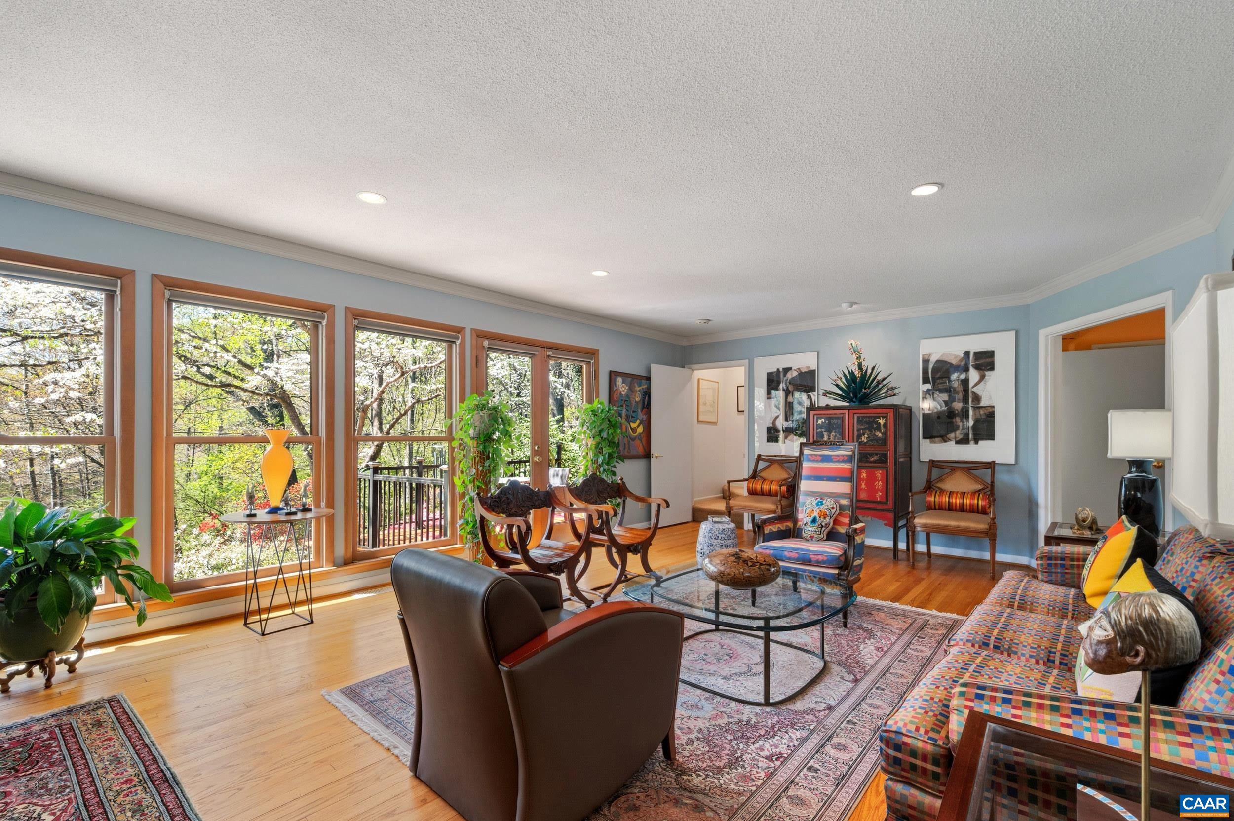 103 Powhatan Circle Charlottesville, VA 22901 - Photo 16 of 75 a living room with furniture and a large window
