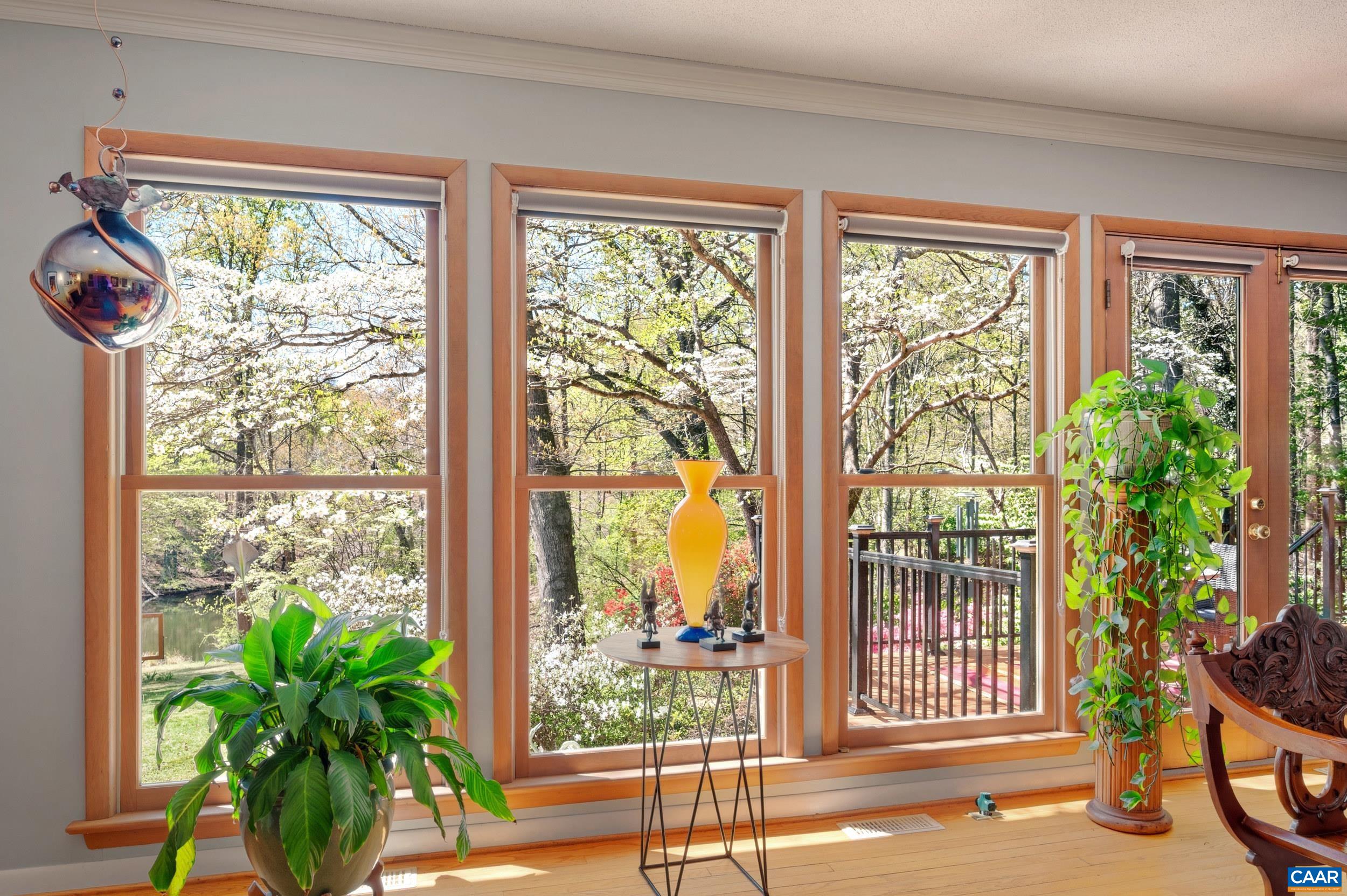 103 Powhatan Circle Charlottesville, VA 22901 - Photo 17 of 75 a view of a room that has a bed and a potted plant