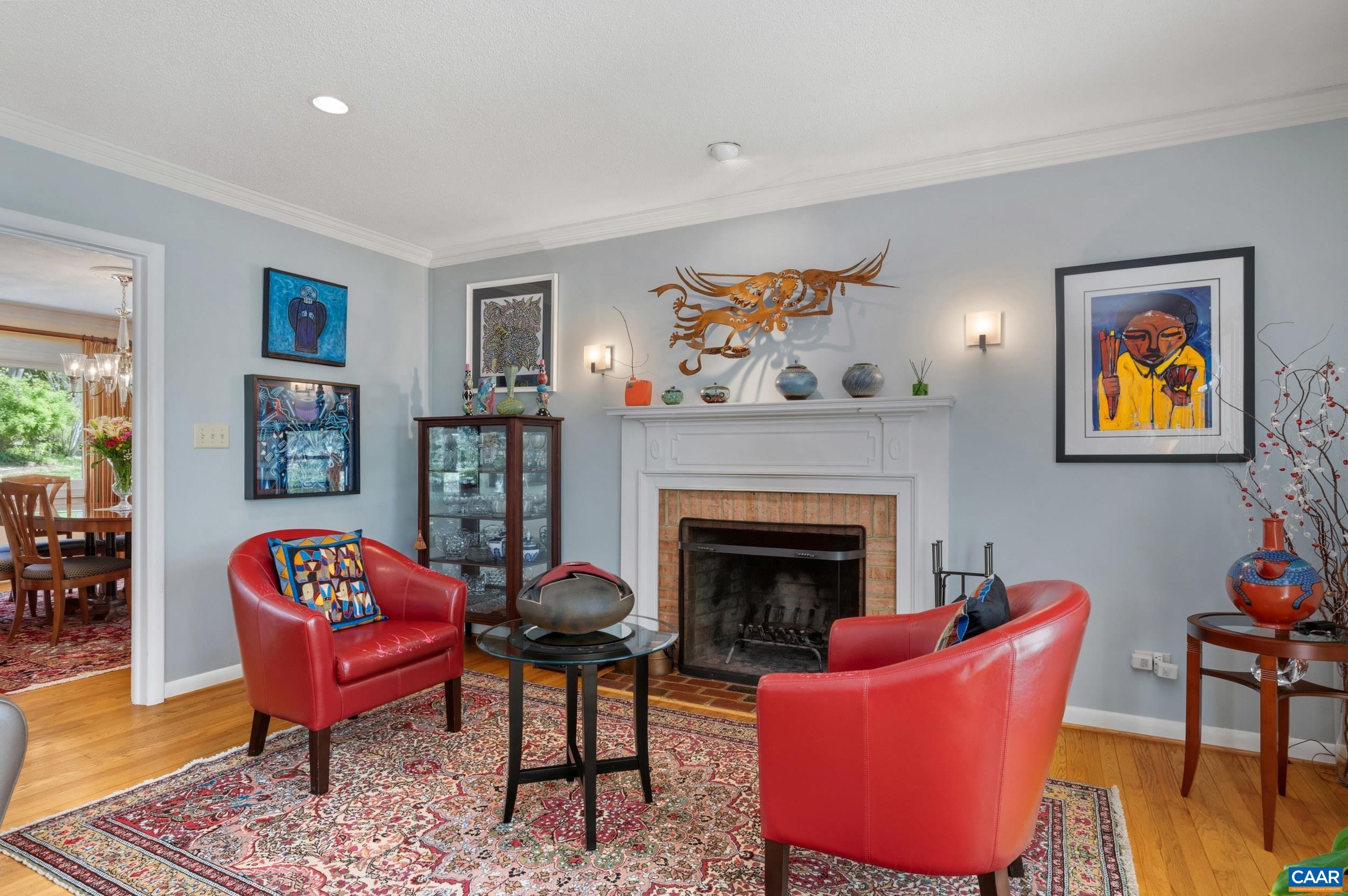 103 Powhatan Circle Charlottesville, VA 22901 - Photo 18 of 75 a living room with furniture a rug and a fireplace