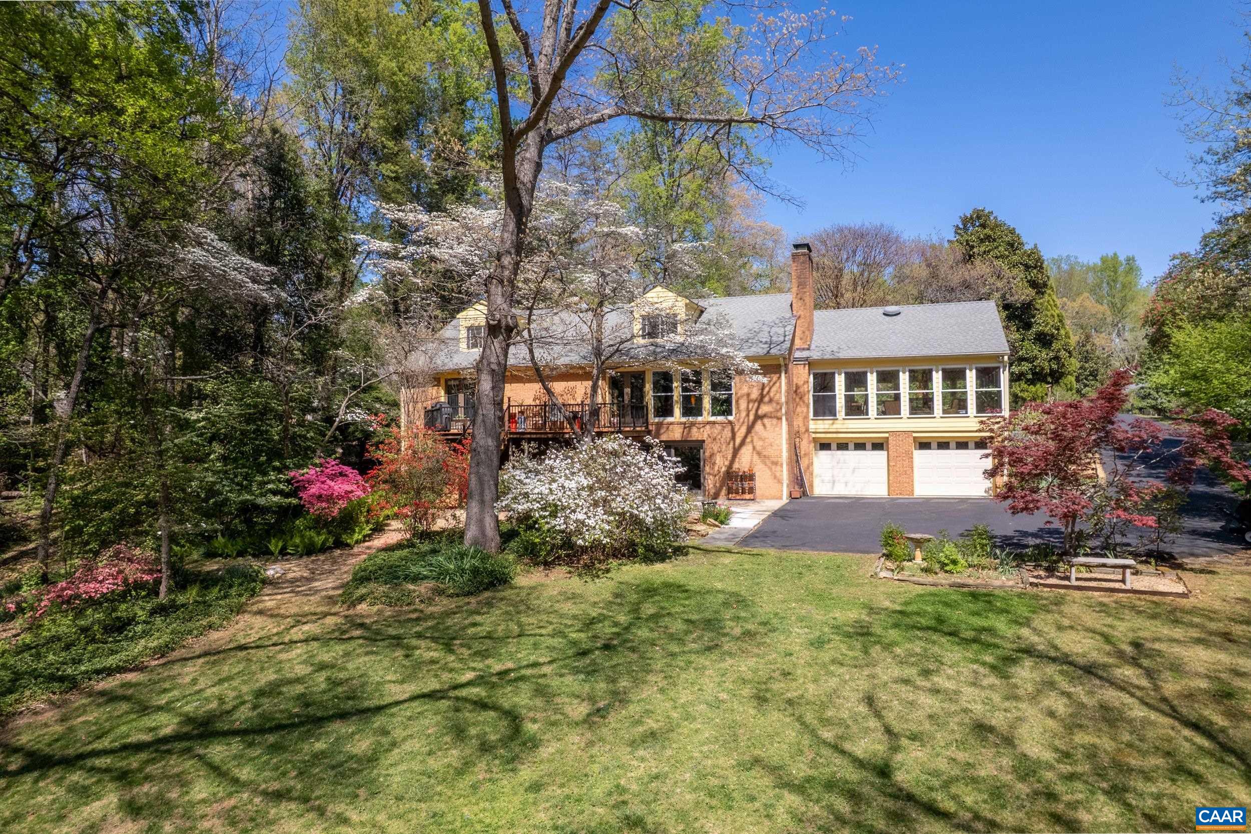 103 Powhatan Circle Charlottesville, VA 22901 - Photo 2 of 75 a view of a house with a yard and sitting area