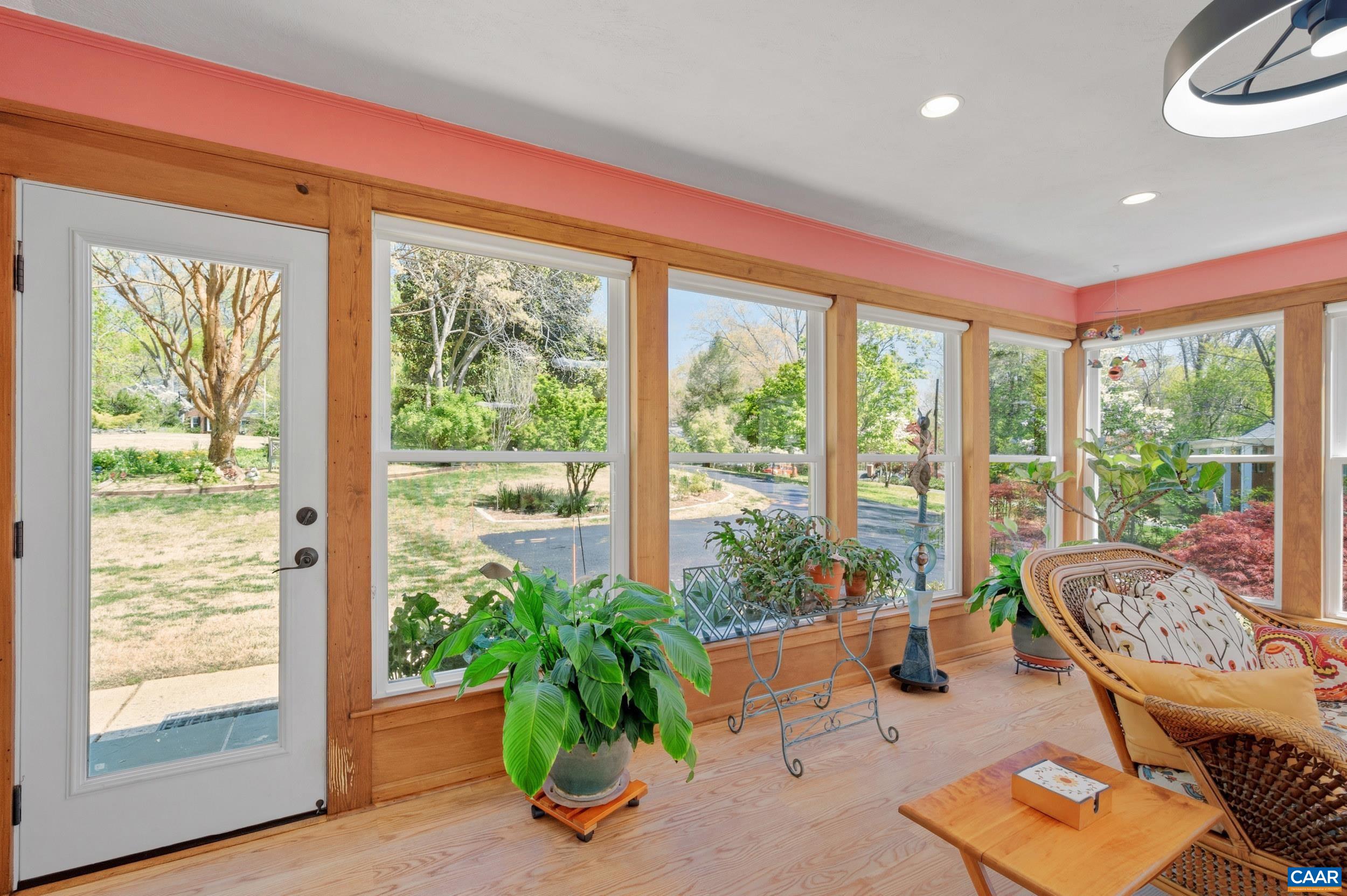 103 Powhatan Circle Charlottesville, VA 22901 - Photo 28 of 75 a living room with patio furniture and a potted plant