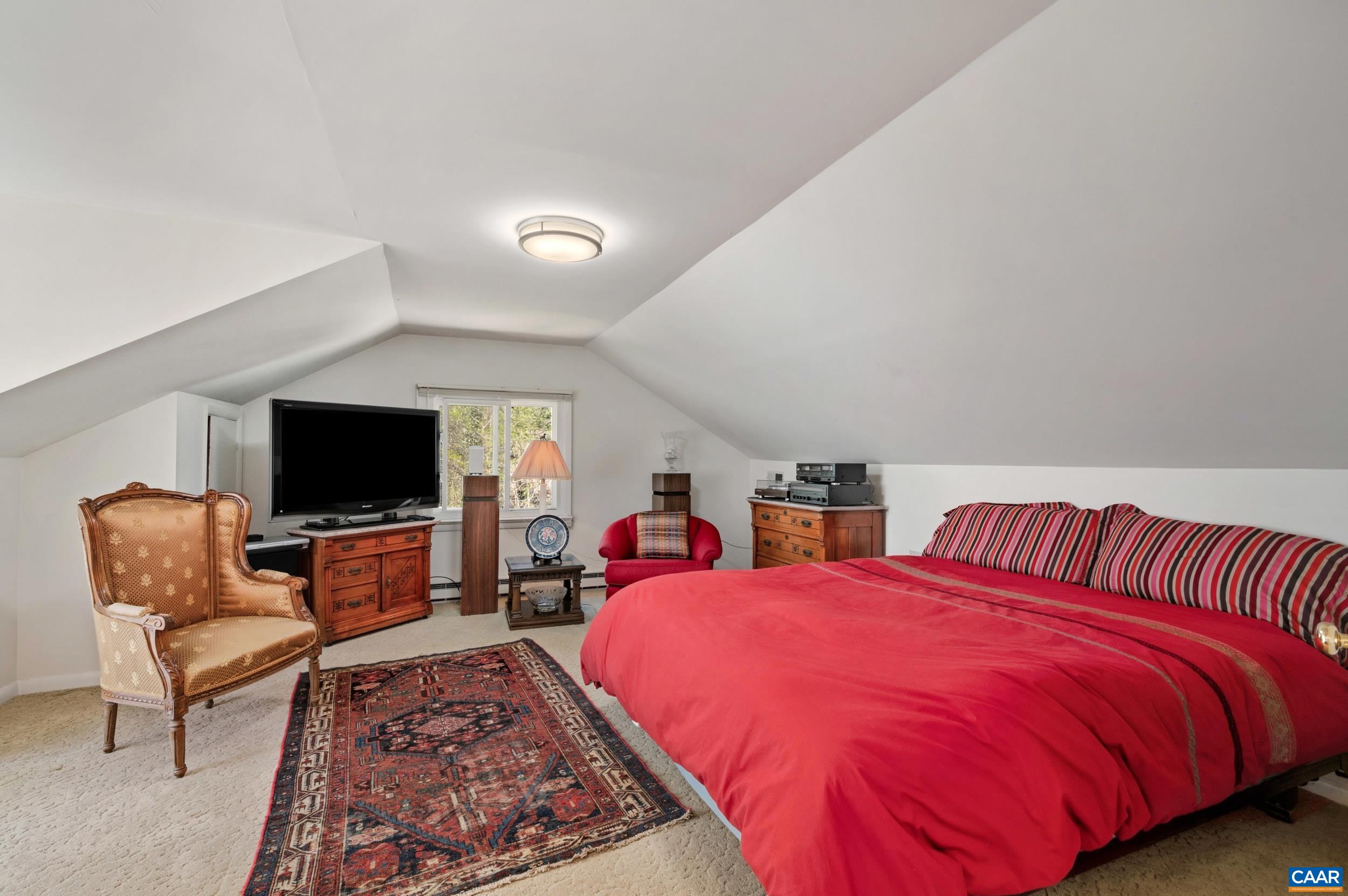 103 Powhatan Circle Charlottesville, VA 22901 - Photo 31 of 75 a bed room with two bed and a television