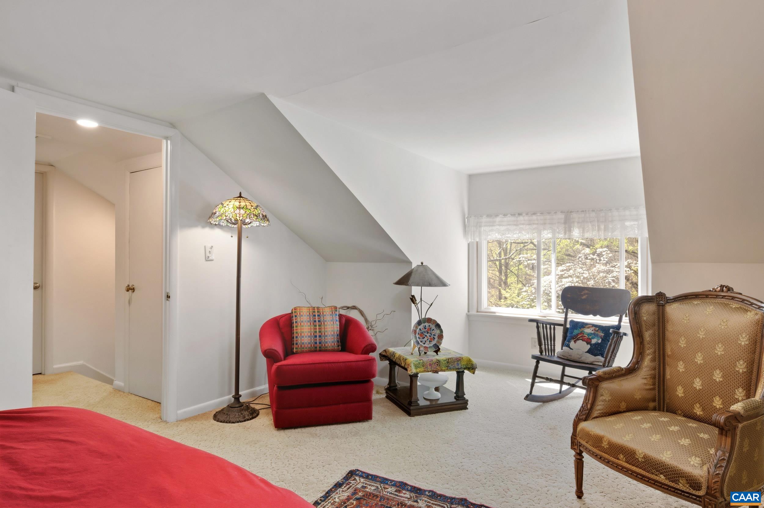 103 Powhatan Circle Charlottesville, VA 22901 - Photo 32 of 75 a living room with furniture and a window