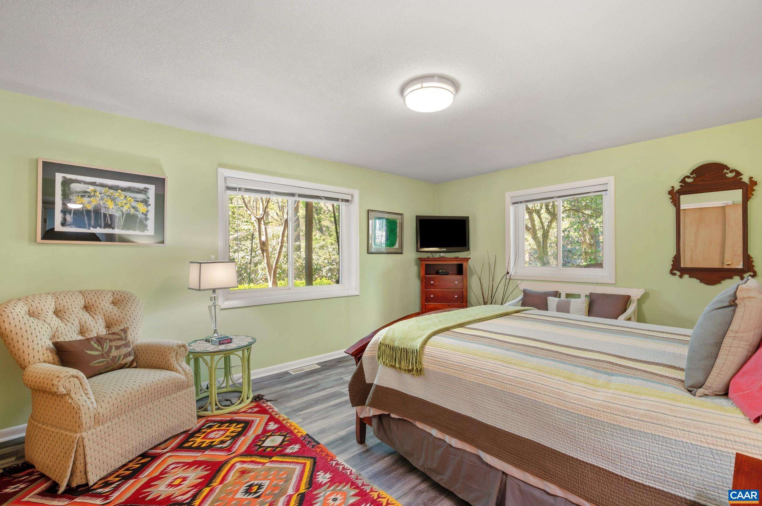 103 Powhatan Circle Charlottesville, VA 22901 - Photo 37 of 75 a bedroom with a bed and a couch