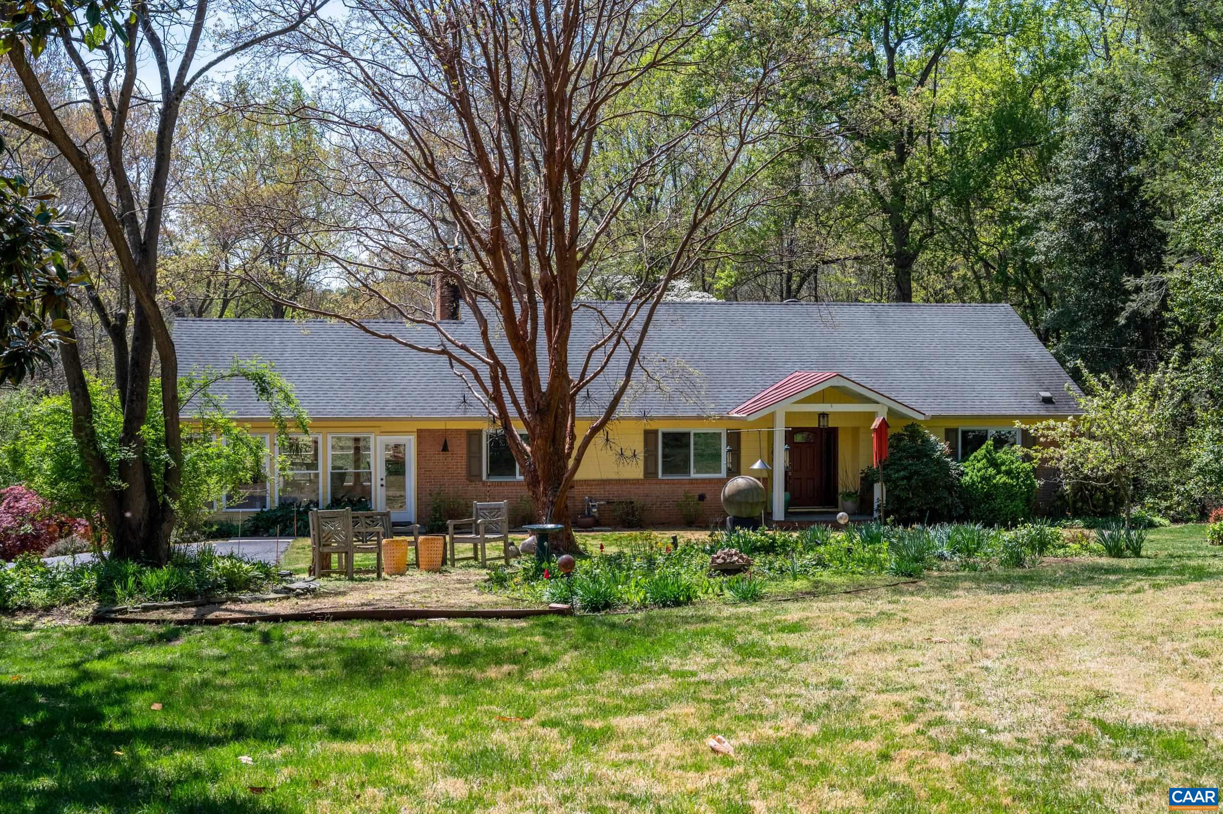 103 Powhatan Circle Charlottesville, VA 22901 - Photo 41 of 75 a front view of a house with a yard