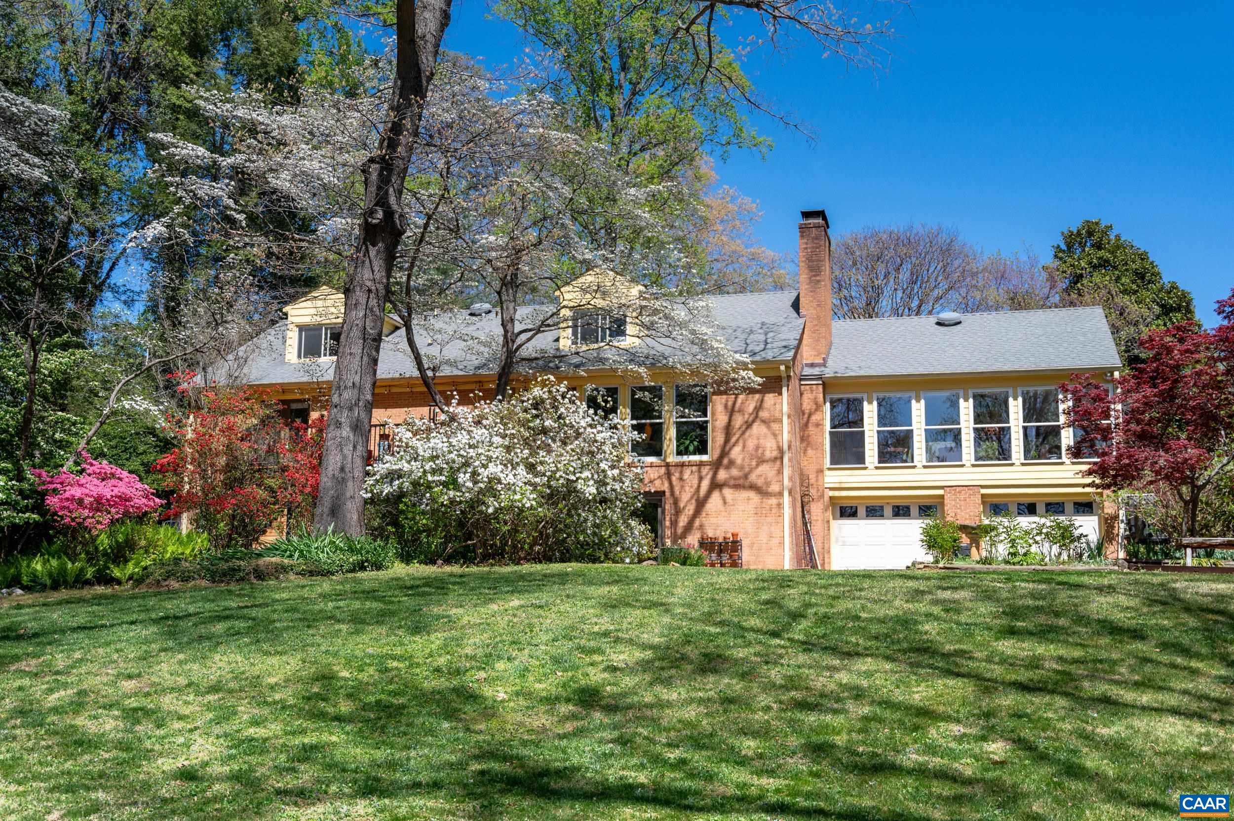 103 Powhatan Circle Charlottesville, VA 22901 - Photo 44 of 75 a front view of house with yard and seating area