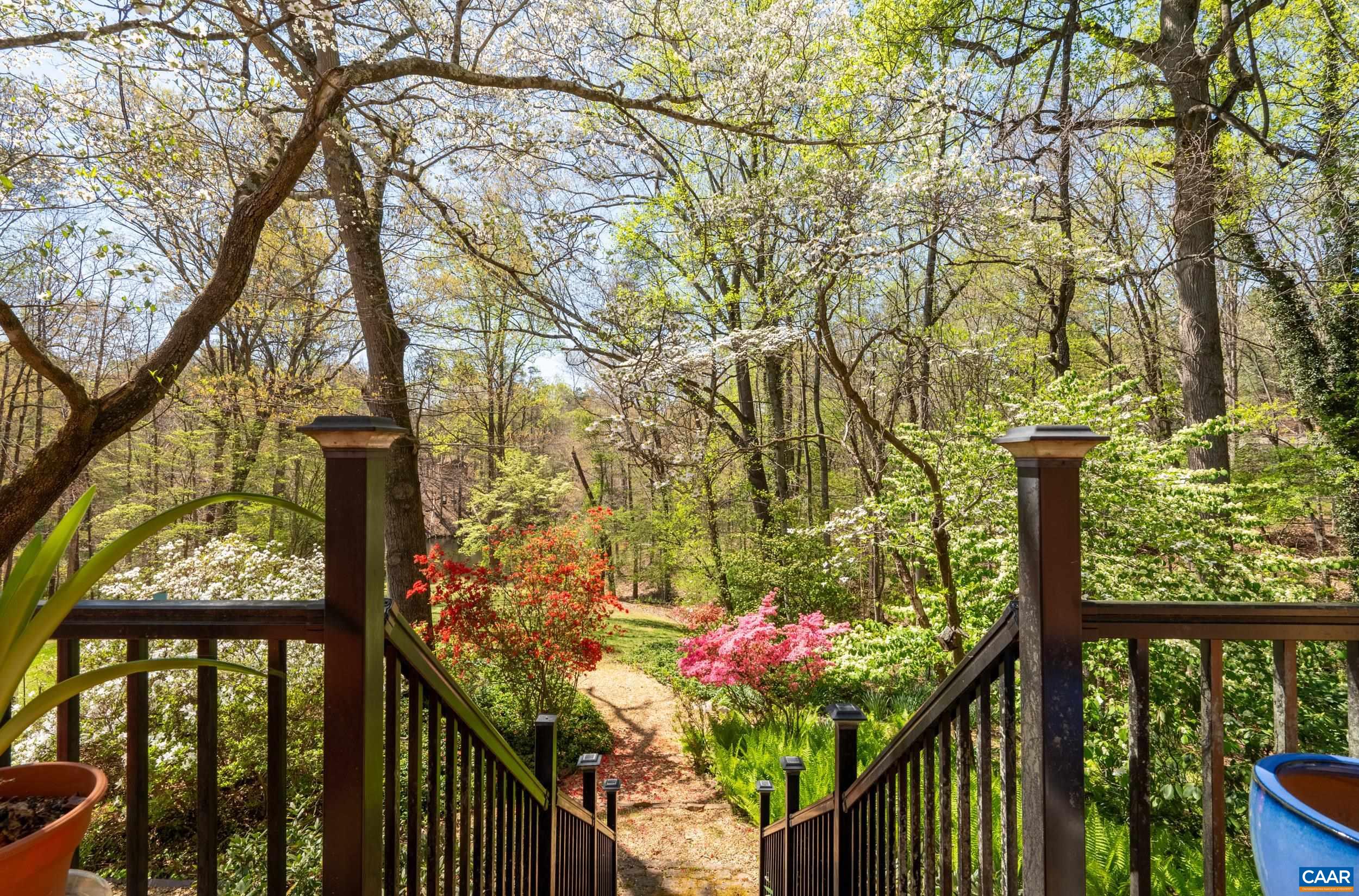103 Powhatan Circle Charlottesville, VA 22901 - Photo 48 of 75 a view of a pathway of a house with wooden fence