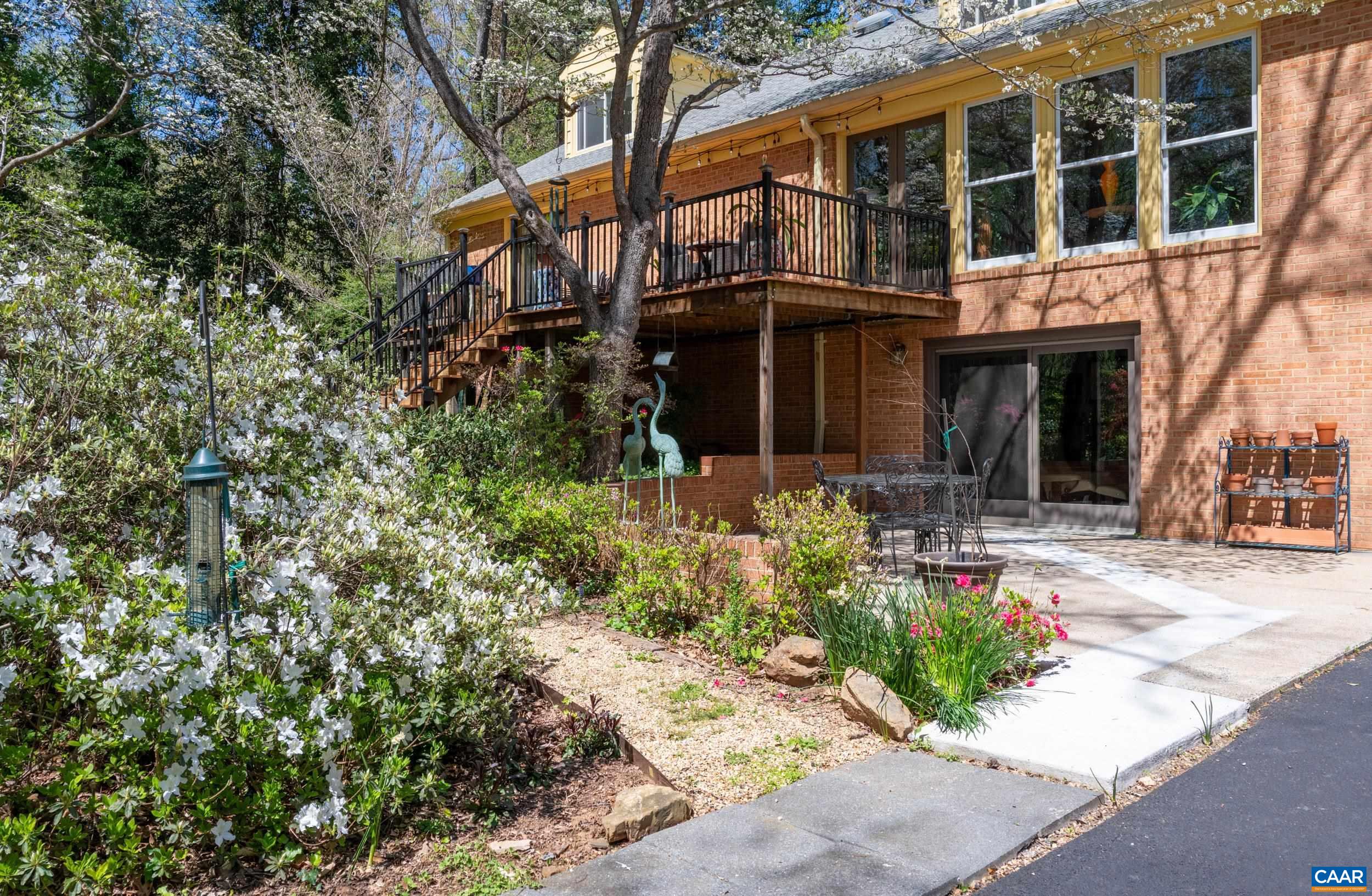 103 Powhatan Circle Charlottesville, VA 22901 - Photo 50 of 75 a front view of a house with a yard