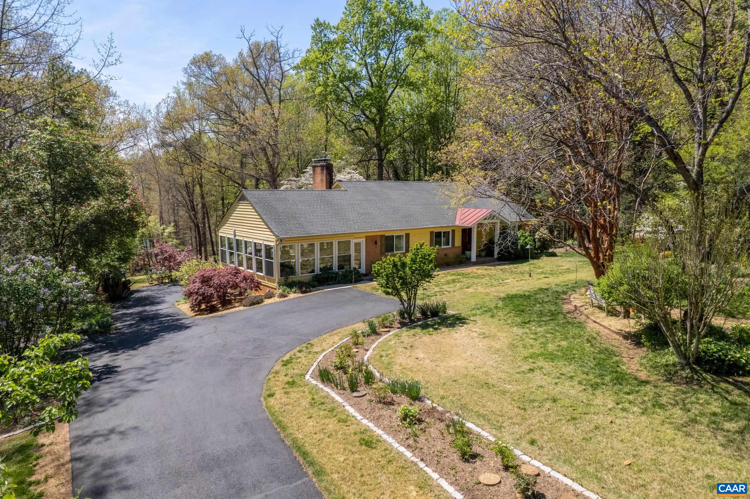 103 Powhatan Circle Charlottesville, VA 22901 - Photo 68 of 75 a view of house with yard and trees in the background