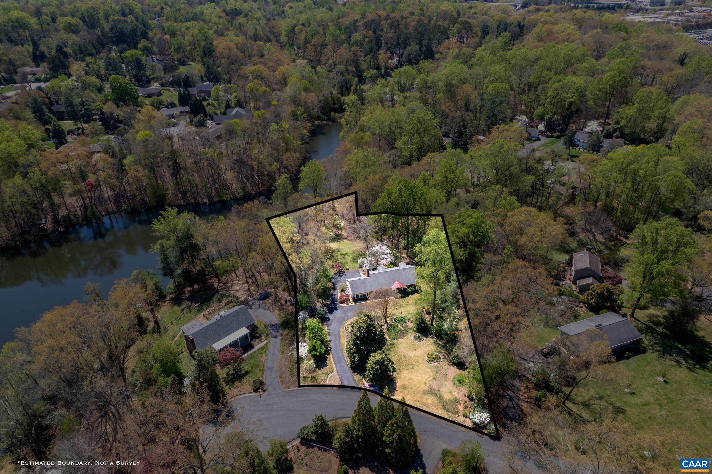 103 Powhatan Circle Charlottesville, VA 22901 - Photo 70 of 75 an aerial view of a house with a yard and lake view