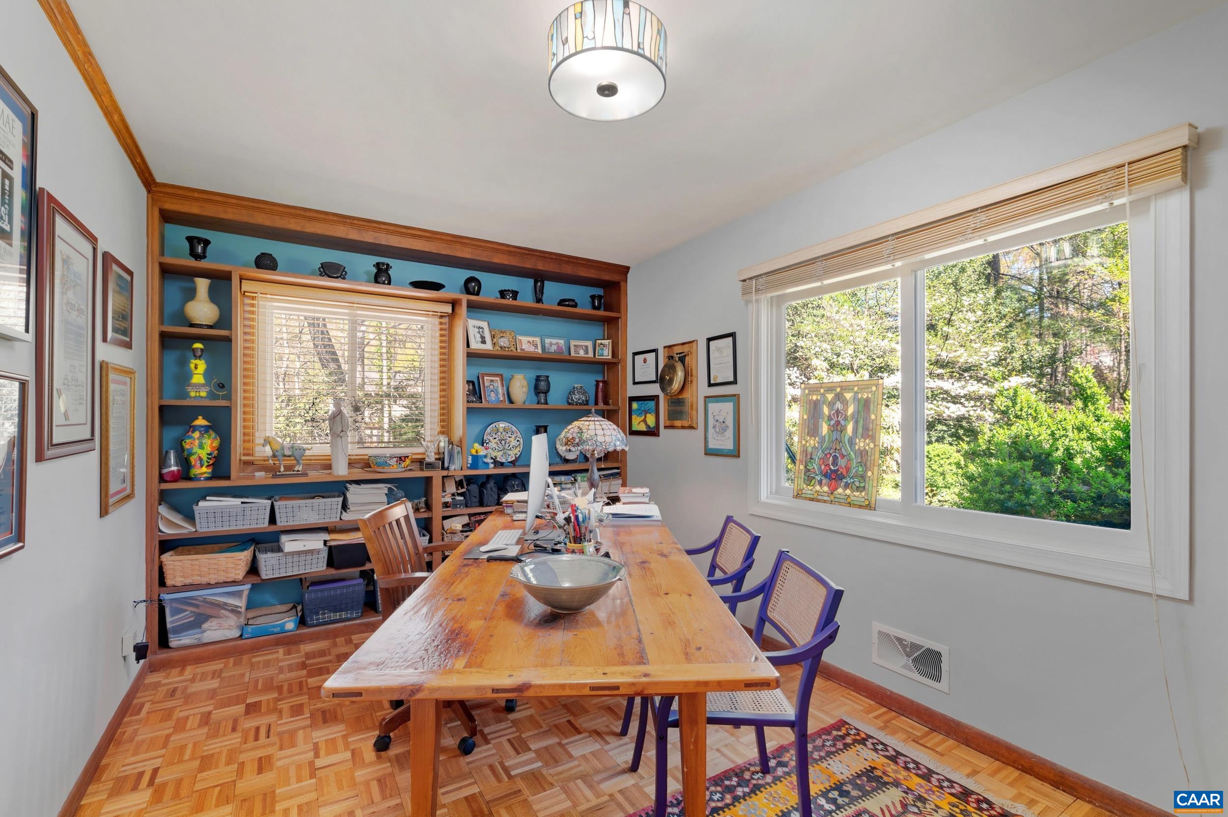 103 Powhatan Circle Charlottesville, VA 22901 - Photo 9 of 75 a living room with furniture and a large window