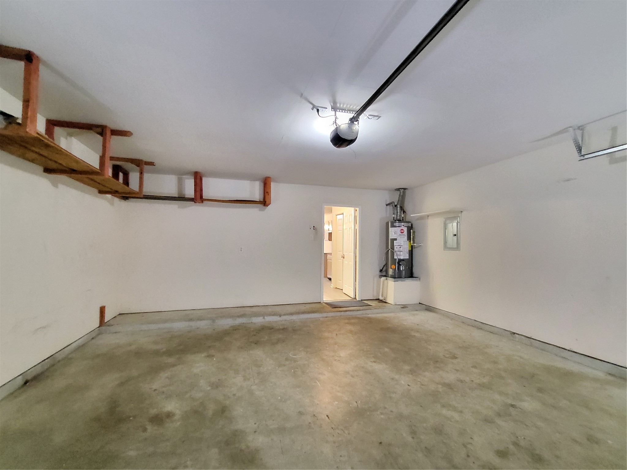 14034 Maximos Drive Houston, TX 77083 - Photo 15 of 27 an empty room with a empty space and windows