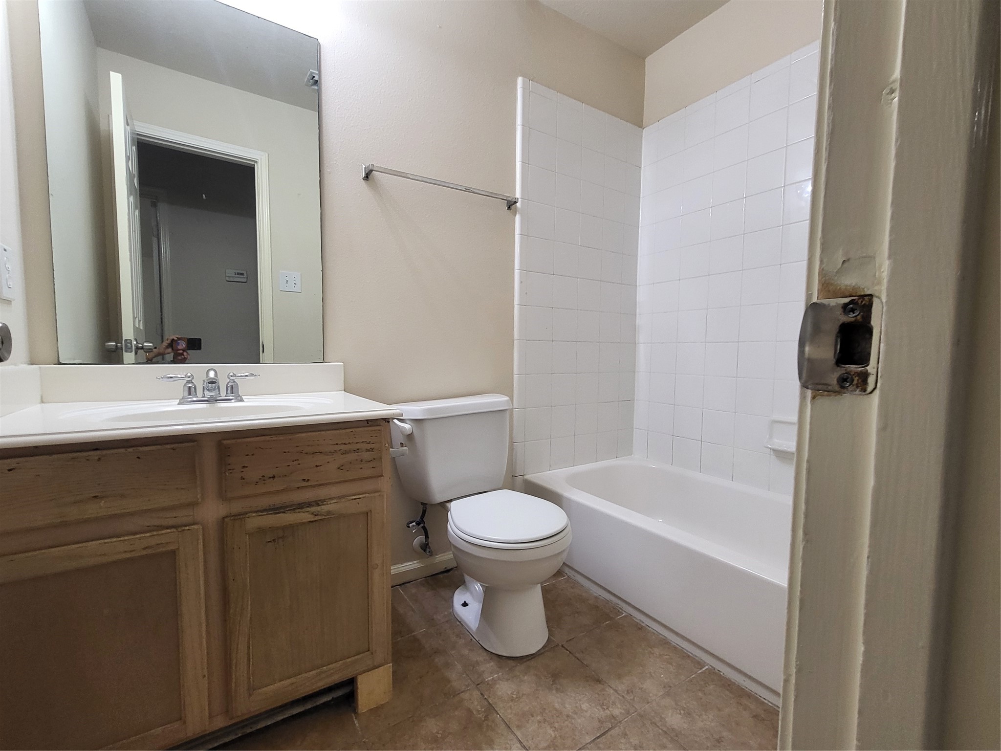 14034 Maximos Drive Houston, TX 77083 - Photo 19 of 27 a bathroom with a sink toilet and a bathtub