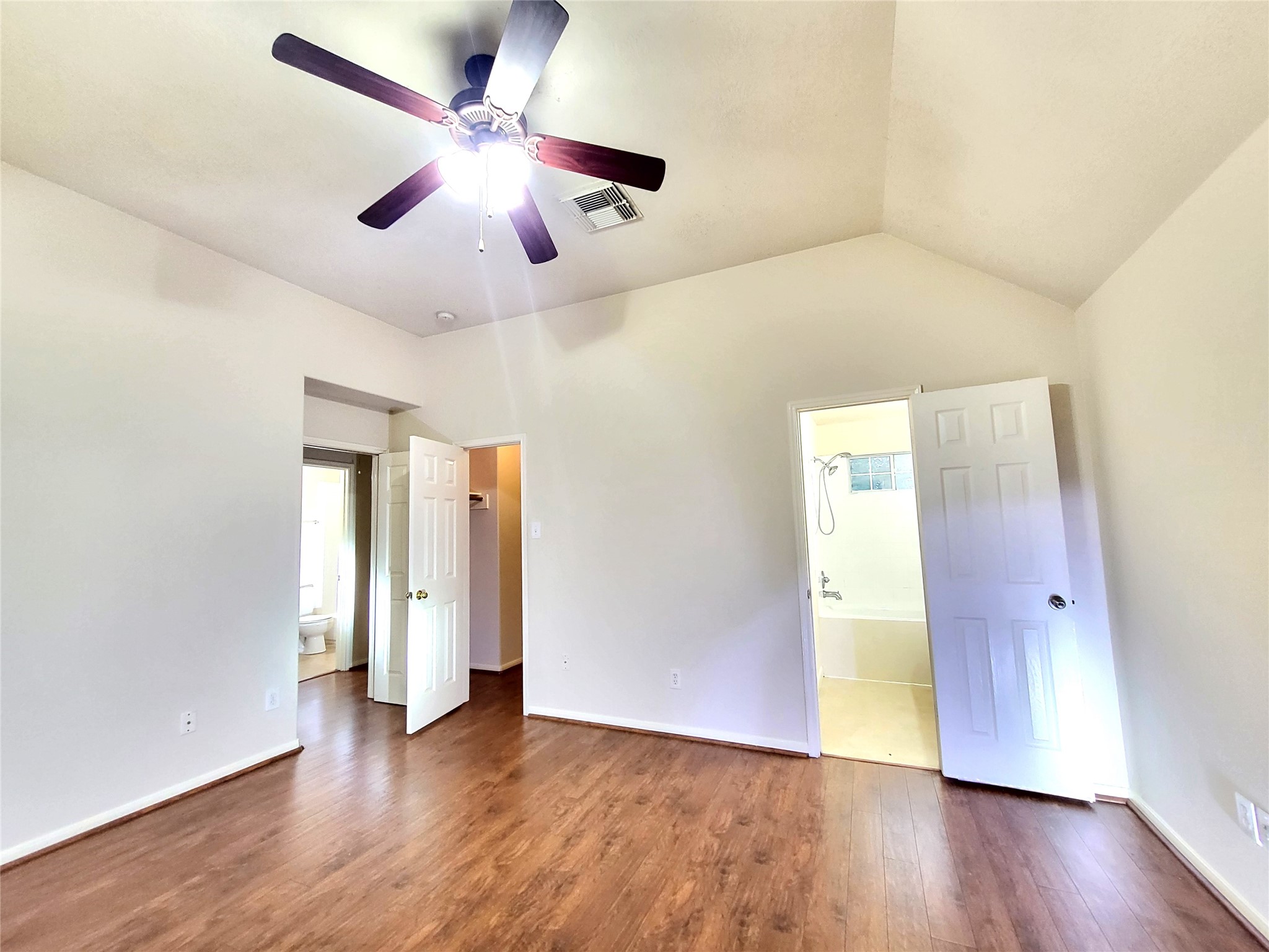 14034 Maximos Drive Houston, TX 77083 - Photo 25 of 27 a view of an empty room with wooden floor