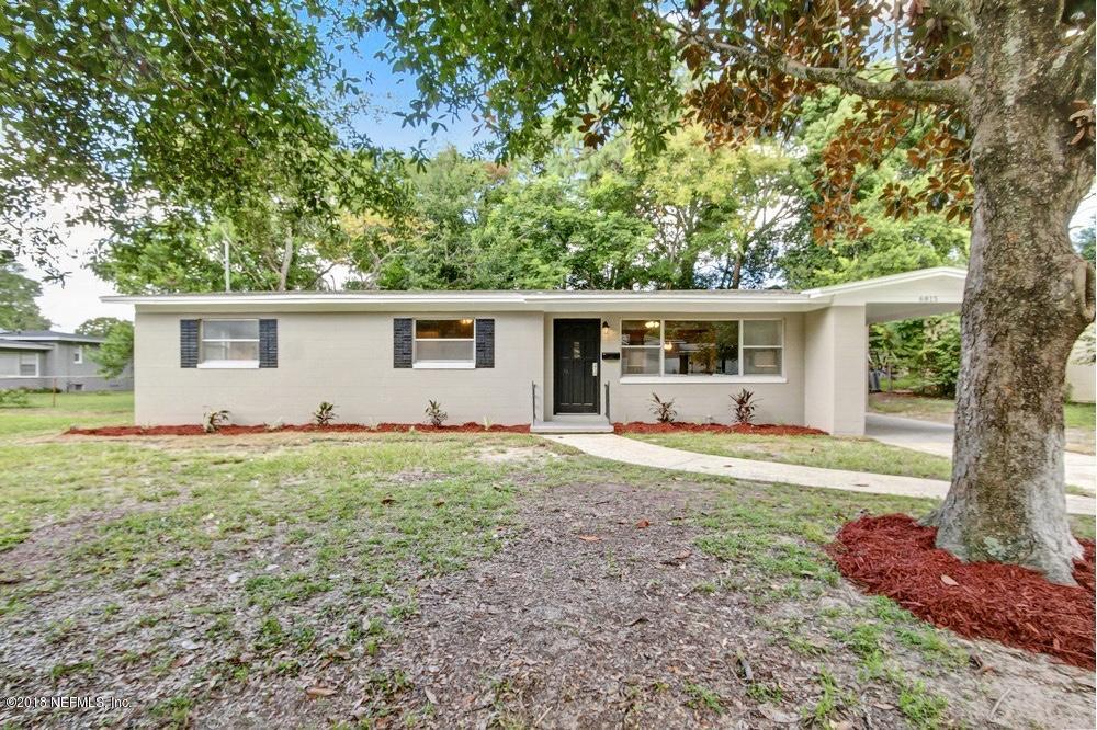 6815 Heidi Road Jacksonville, FL 32277 - Photo 35 of 36 a view of a house with backyard and garden