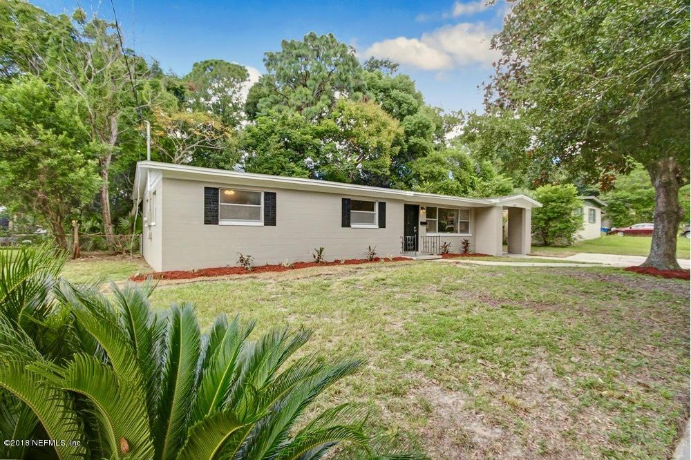 6815 Heidi Road Jacksonville, FL 32277 - Photo 36 of 36 a front view of house with yard and trees