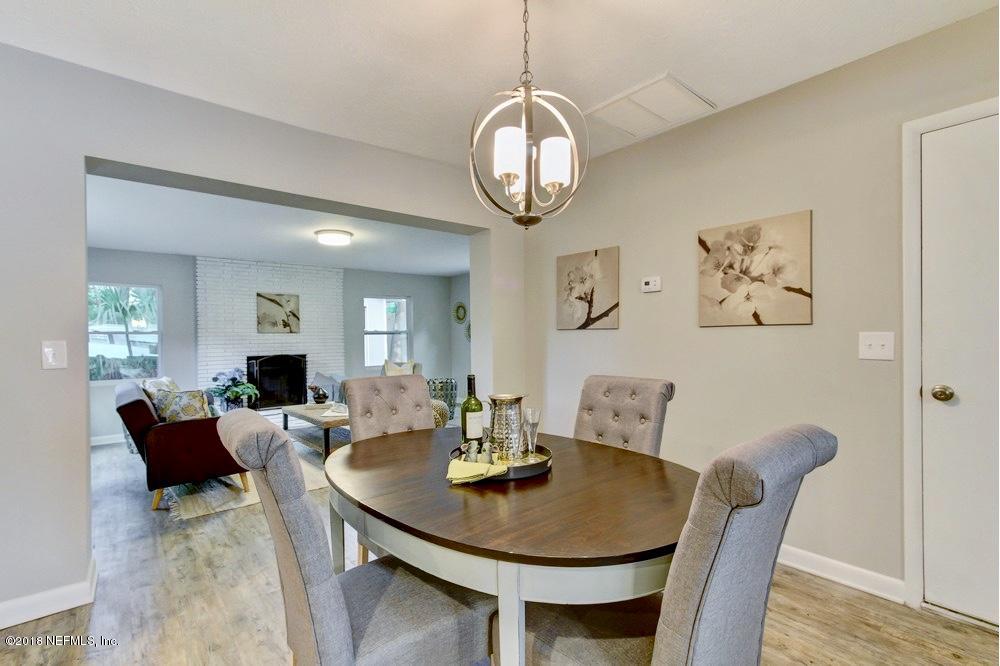 6815 Heidi Road Jacksonville, FL 32277 - Photo 8 of 36 a view of a dining room with furniture