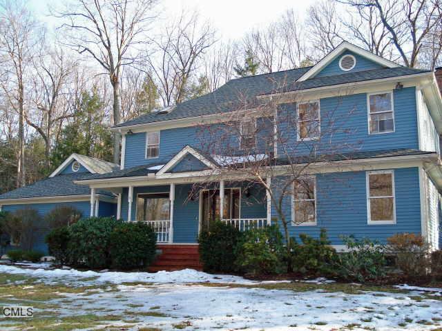 28 Jeremiah Road Newtown, CT 06482 - Photo 1 of 1 a front view of a house with a yard