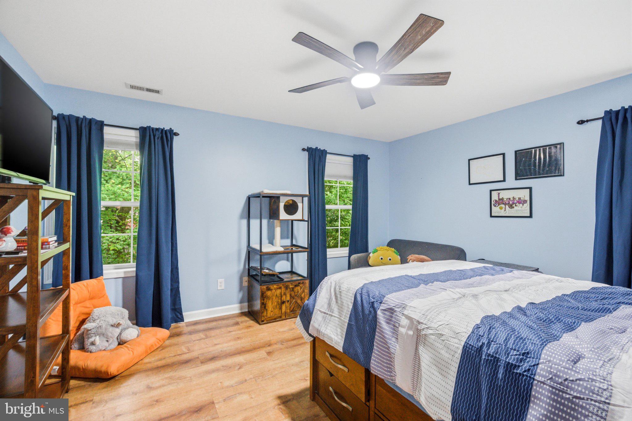 706 Main Street Riverton, NJ 08077 - Photo 26 of 44 Serene blue-hued bedroom retreat.