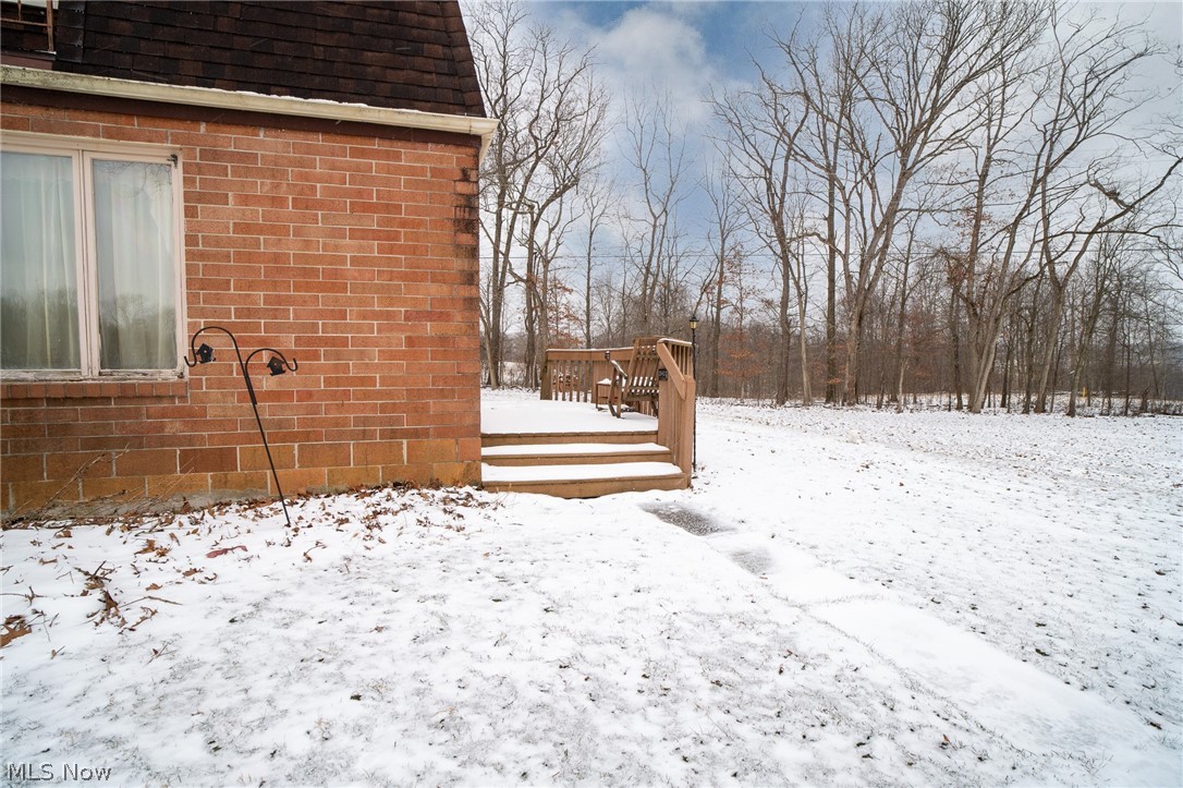 11 Pacific Road Northeast Carrollton, OH 44615 - Photo 38 of 46 Side deck/porch with large yard