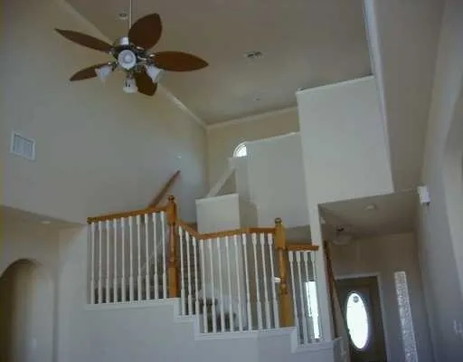 a view of an entryway with a chandelier