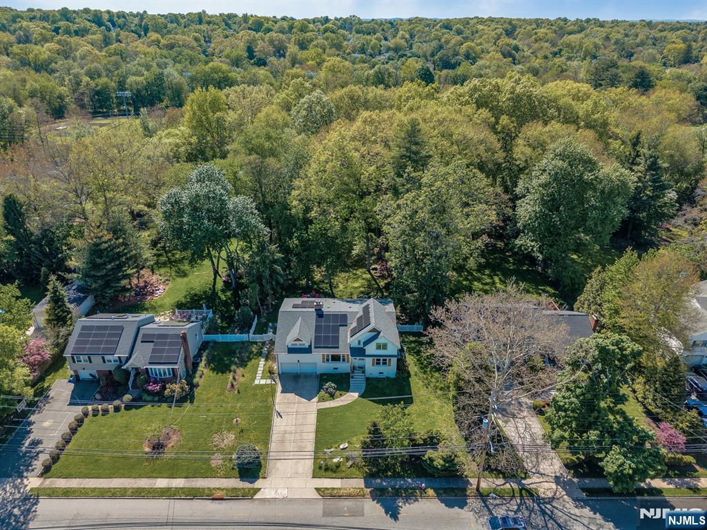 433 Piermont Road Cresskill, NJ 07626 - Photo 47 of 49 an aerial view of a house with a garden