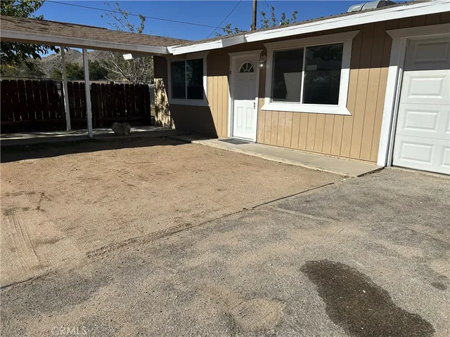 a view of a house with a outdoor space