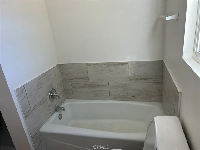 a bathroom with a bathtub