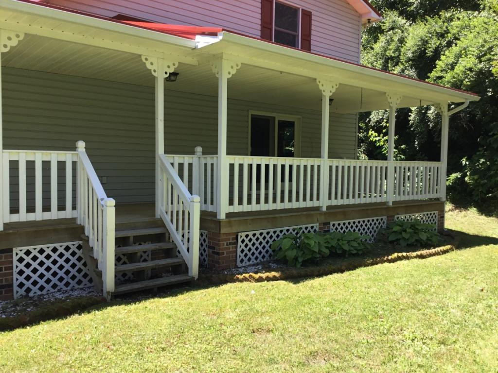 10339 Killen Hollow Road Pound, VA 24279 - Photo 5 of 30 WRAP AROUND PORCH